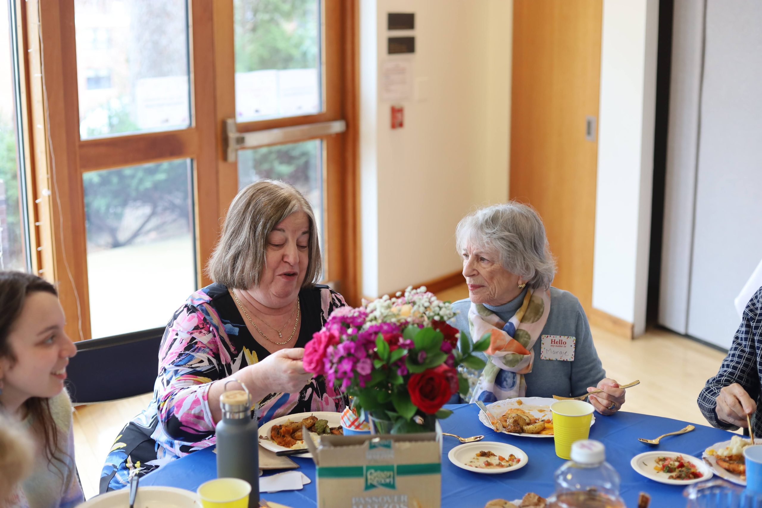 Cabot Park Village residents sharing a meal with Tufts students